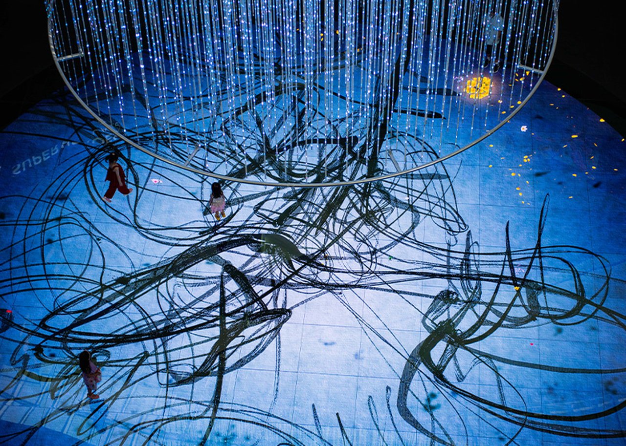 People on a globe, connected by network cables